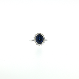 Bague “Éclat Royal” – Saphir Bleu synthétique & Halo de Diamants